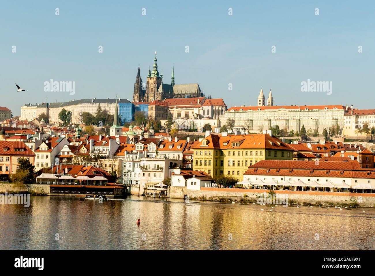 A view from the Charles Bridge across the river, Vitava of St Vitus`s Cathedral and the Royal Palace Stock Photo